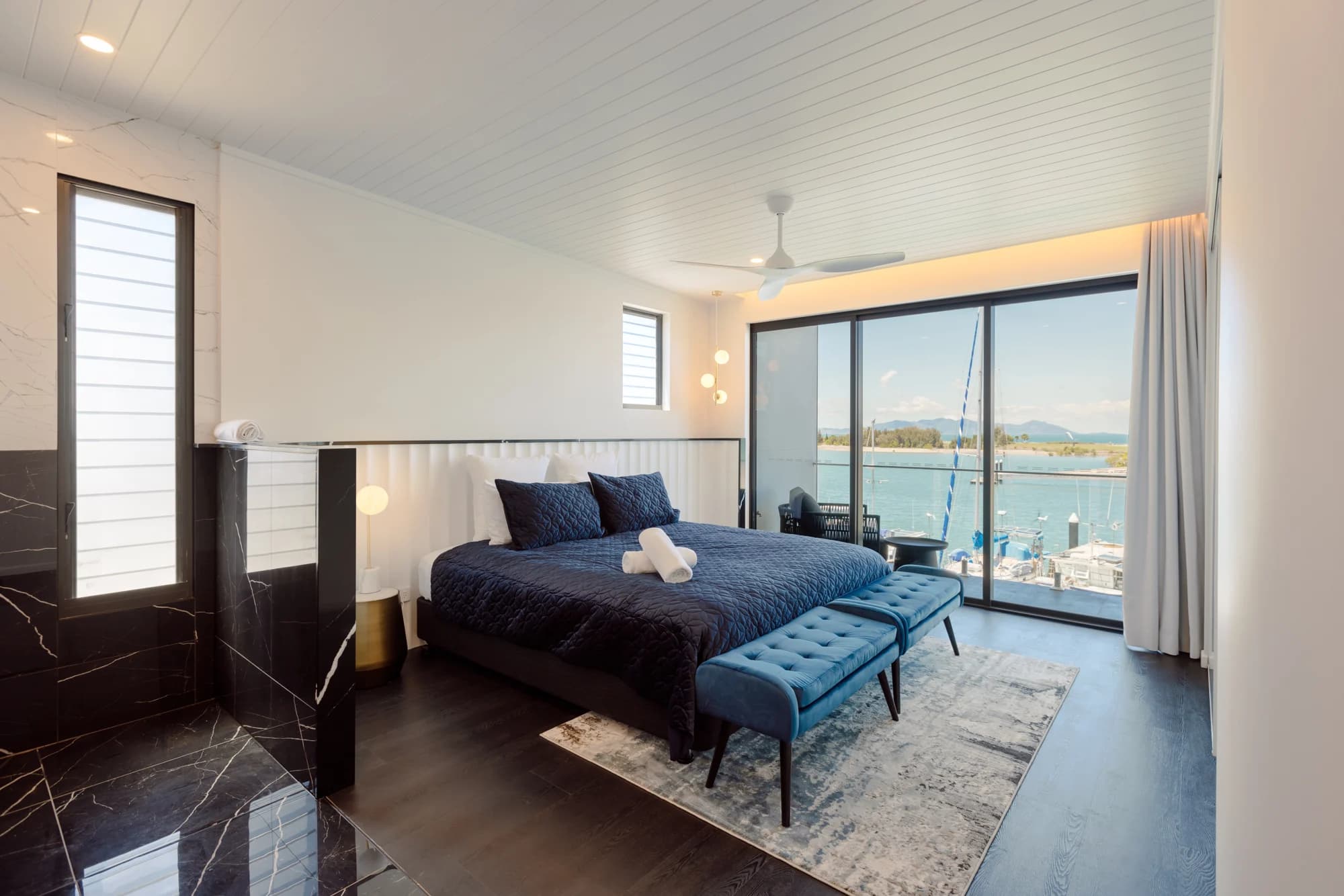 Bay-facing bedroom at Lavish